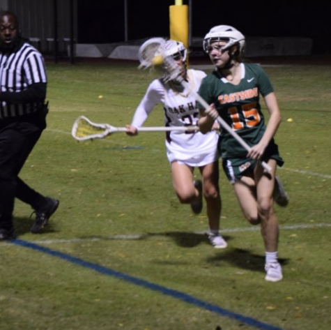 Eastside midfielder Bridget Williams runs the ball down the field with a defender during an earlier game in the season. 