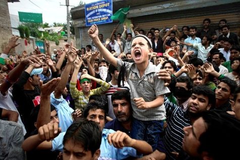 A Kashmiri boy shouts slogans during a protest outside of Srinagar, Jammu and Kashmir state in India on Monday. At least 14 protesters died. Illustration: Associated Press
https://www.wsj.com/articles/SB10001424052748703466704575489451188515956